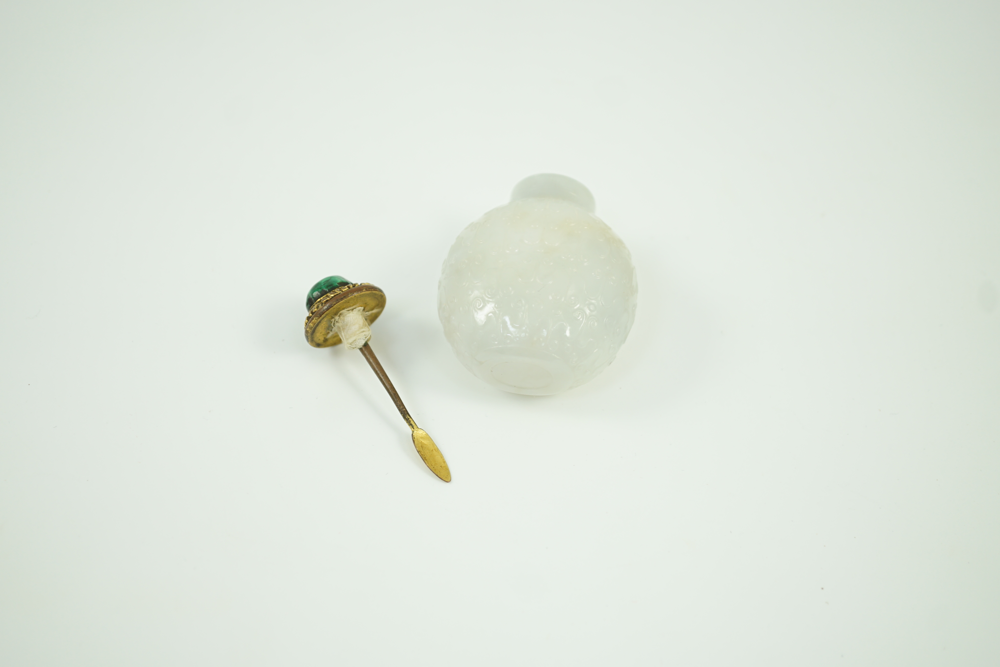 A good Chinese archaistic white jade snuff bottle, 1780-1850